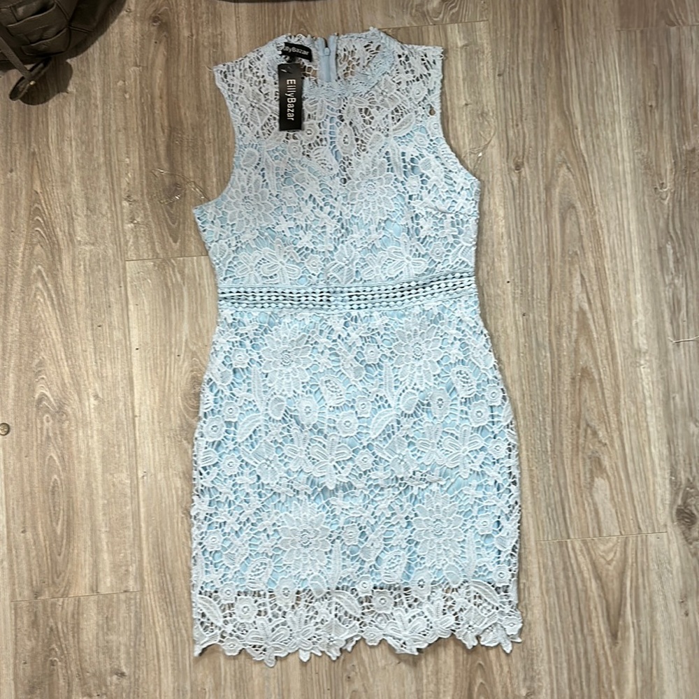 Beautiful blue lace dress with peek-a-boo waist line